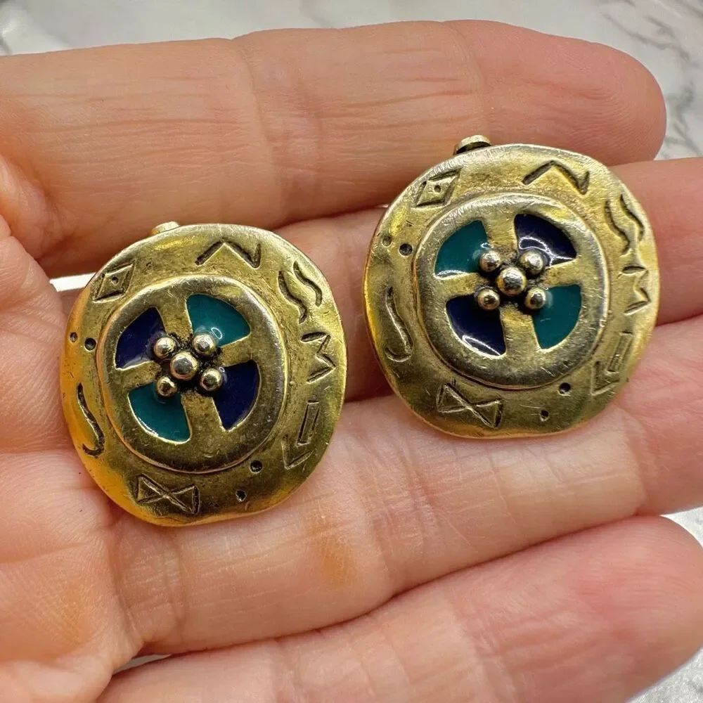 C. Stein gold tone round  vintage clip on earrings